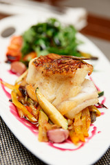 White fish fillet with vegetables