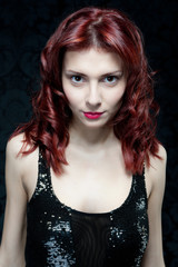 beautiful woman with red hair and black top