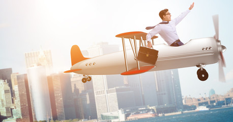 Businessman flying on vintage old airplane