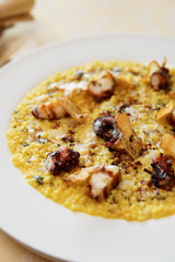 Fregola pasta with grilled octopus