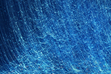 Blue abstract sparkles or glitter lights. Festive background. Defocused circles bokeh or particles. Template for design