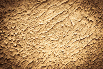 Grungy golden or vintage white background of old concrete plaster wall. Conceptual old texture banner