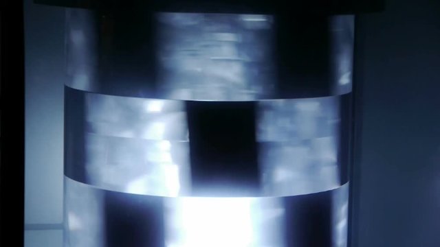Rotating neon light.