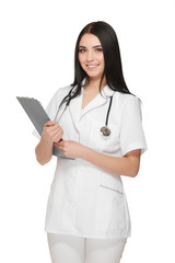 Beautiful brunette doctor in white uniform  posing with tablet