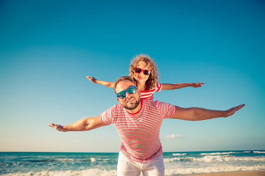 Happy family having fun on summer vacation