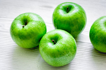 summer food with green apples on white background
