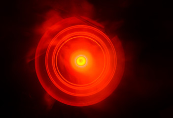 Concept of speed - Trail of fire and smoke - Vinyl record. Burning vinyl disk. Turntable vinyl record player. Retro audio equipment for disc jockey. Sound technology. Close up