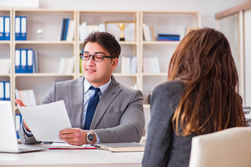 Business meeting between businessman and businesswoman