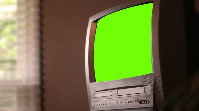 Green Screen old TV in office setting from the 1990s for generic use