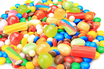 Fototapeta na wymiar Tasty and colorful candies, closeup