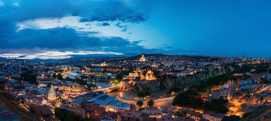 Tbilisi Georgia. Scenic Panoramic Top View Of Cityscape In Evening
