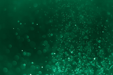 Bokeh Background Very dark cyan - lime green.