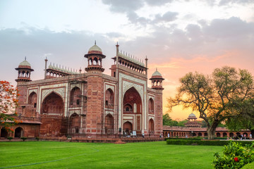 Taj Mahal's western gate at sunrise, Agra, India