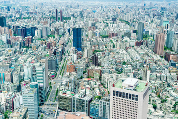 Asia Business concept for real estate and corporate construction - panoramic modern cityscape building bird eye aerial view under sunrise and morning blue bright sky, shot in Taipei 101, Taiwan