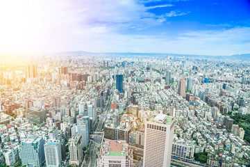Asia Business concept for real estate and corporate construction - panoramic modern cityscape building bird eye aerial view under sunrise and morning blue bright sky, shot in Taipei 101, Taiwan