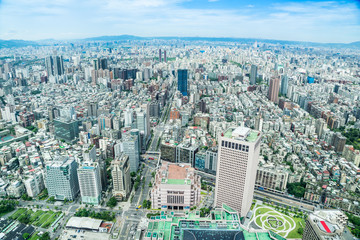 Naklejka premium Asia Business concept for real estate and corporate construction - panoramic modern cityscape building bird eye aerial view under sunrise and morning blue bright sky, shot in Taipei 101, Taiwan