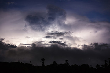 Thundercloud illuminated by lightning