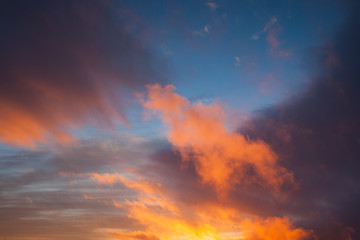 Fototapeta na wymiar Sunset colors at cloud sky
