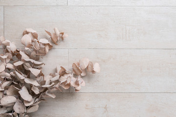 Dry flowers on wooden background.wedding wallpaper concept.