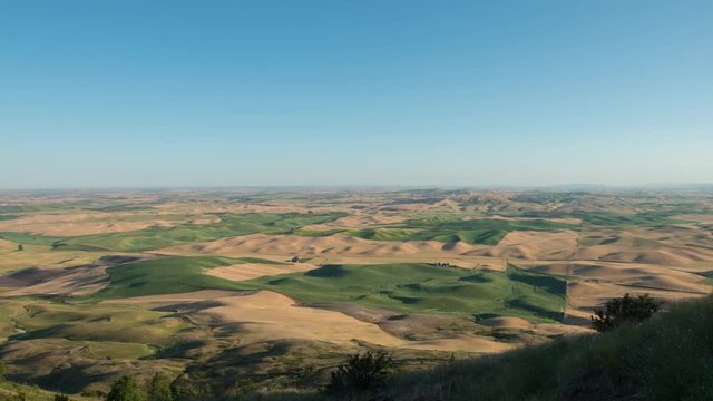 4K Time lapse zoom in shot that the shadow of wheat field in Palouse Steptoe Butte is breaking in USA.