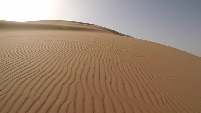 sunrise in Liwa desert, part of Empty Quarter, the largest sand desert in the world