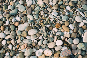 Old Pebble Stones Natural Background. Top View Of Multicolored Stouns