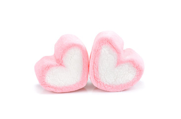 Heart shape marshmallow with on background, Pink heart shape marshmallow for love theme and Valentine background concept.Romance pink heart pastel color.