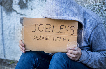 Jobless man begging on a street