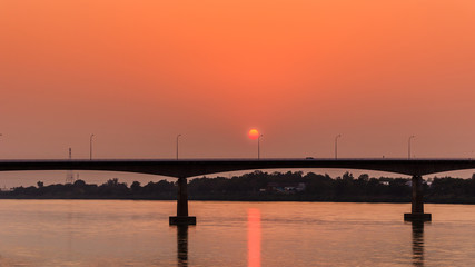 Bridge across the Mekong River at sunset. Thai-Lao friendship bridge at Nong Khai Thailand