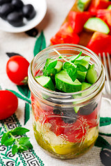  Greek salad  in  Mason jar. style rustic