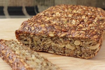 seed and nut loaf on cutting board