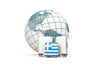 Luggage with flag of greece. Three bags in front of globe