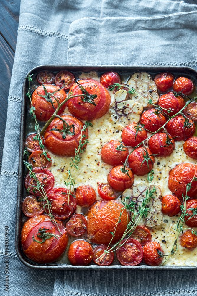 Sticker Fresh tomatoes, feta, garlic and thyme on the tray