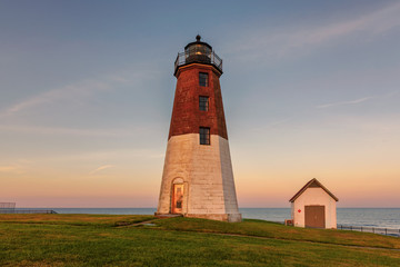 The Point Judith lighthouse at sunset near Narragansett, Rhode Island, USA.