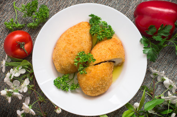 Chicken cutlets on Kiev. Old background. Top view. Close-up
