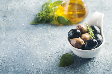 Bowl filled with fresh black olives