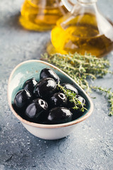 Bowl filled with fresh black olives