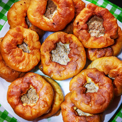 Small fried patties with meat and onions.