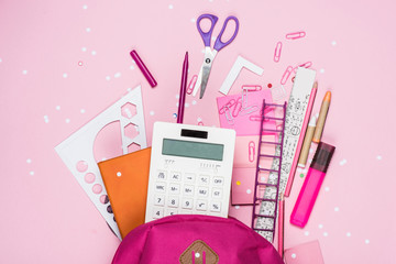 close up view of various school supplies in schoolbag