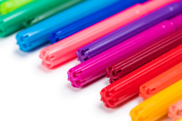 Close-up view of set of colorful felt tip pens isolated on white