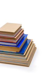 stack of different books isolated on white, educational concept