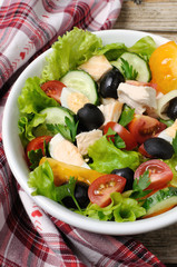 Vegetable salad with chicken and eggs