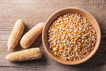 Corn kernels in a wooden bowl