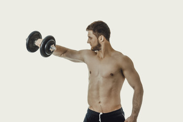 Fototapeta na wymiar Muscular sports man weightlifting.