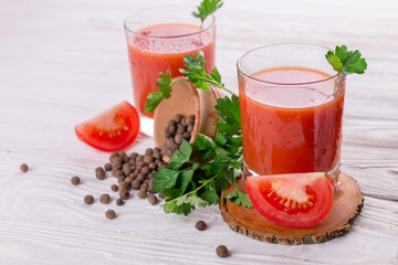 Tomato juice on white background