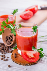 Tomato juice on white background
