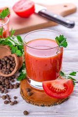 Tomato juice on white background