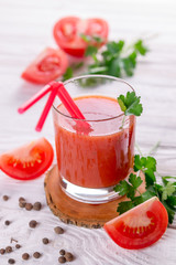 Tomato juice on white background