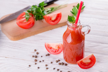 Tomato juice on white background