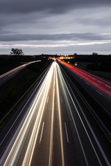 Cars in evening street traffic